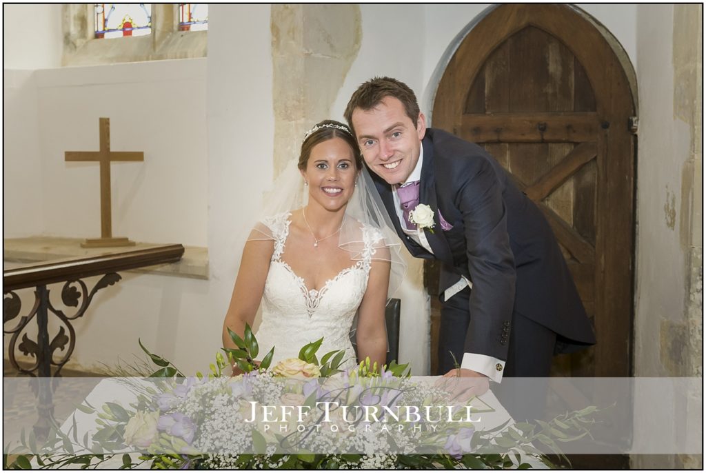 Bride and Groom sign register