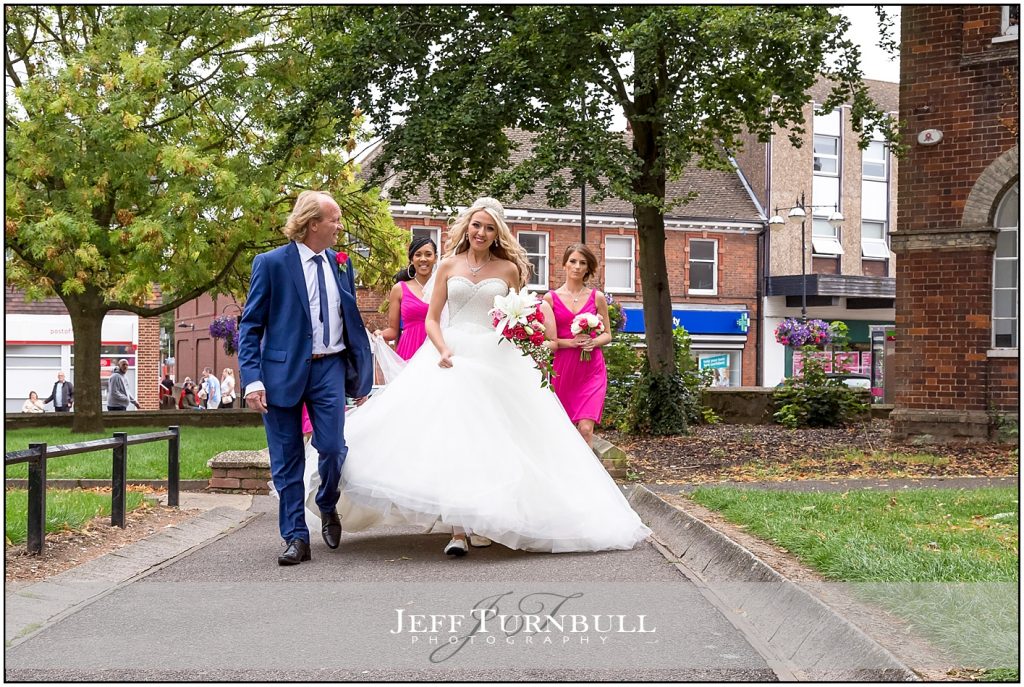 Bride and Dad Walking to Church