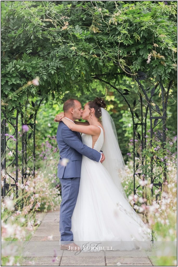 Bride and Groom Kissing at Gaynes Park