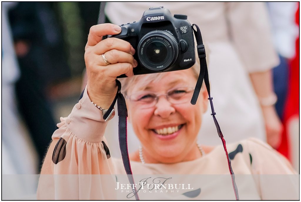 Wedding Guest with Camera