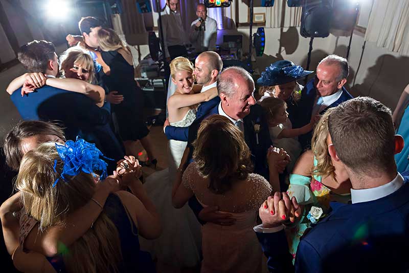 Bride, Groom and Guests Dancing Together at The Reid Rooms